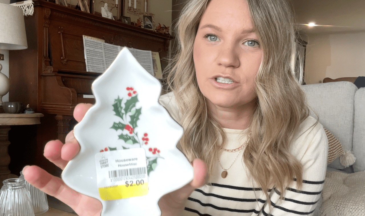 blond woman holding a small christmas tree shaped tray in her hand showing it to the camera